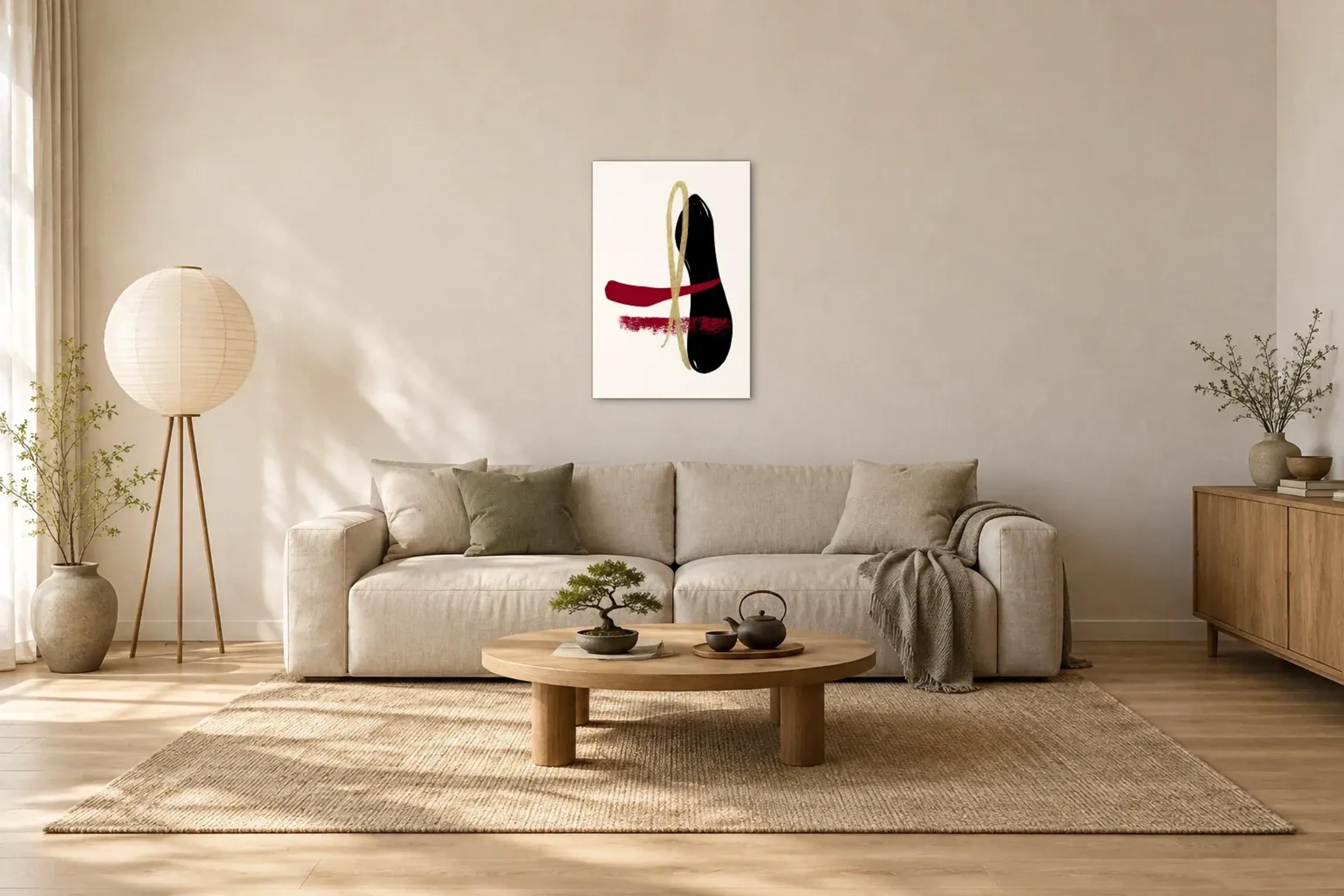 Goldschleife auf Schwarz als Wandbild über einem 220-cm-Sofa