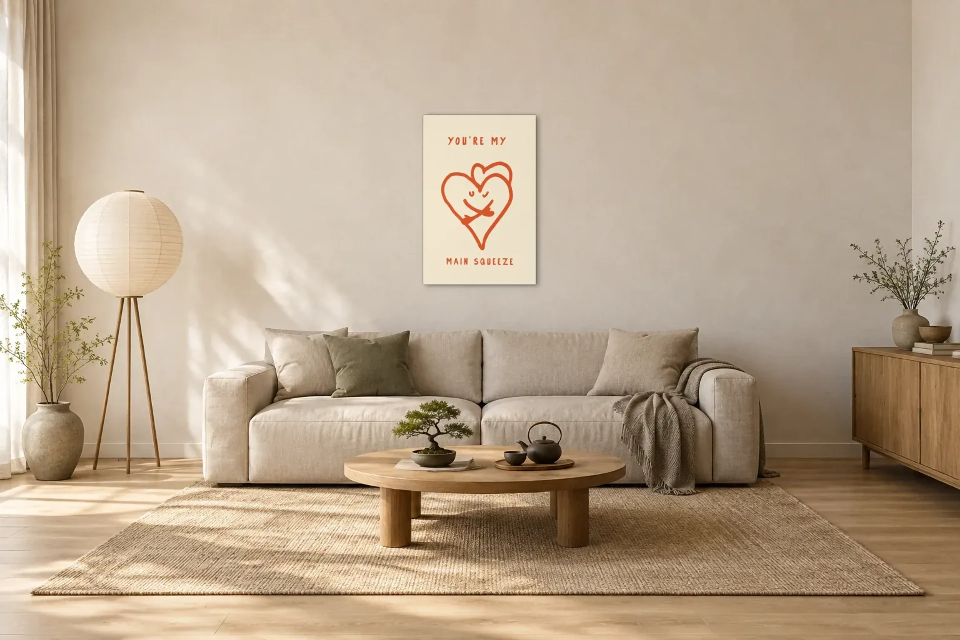 Herzen mit Liebesbotschaft als Wandbild über einem 220-cm-Sofa