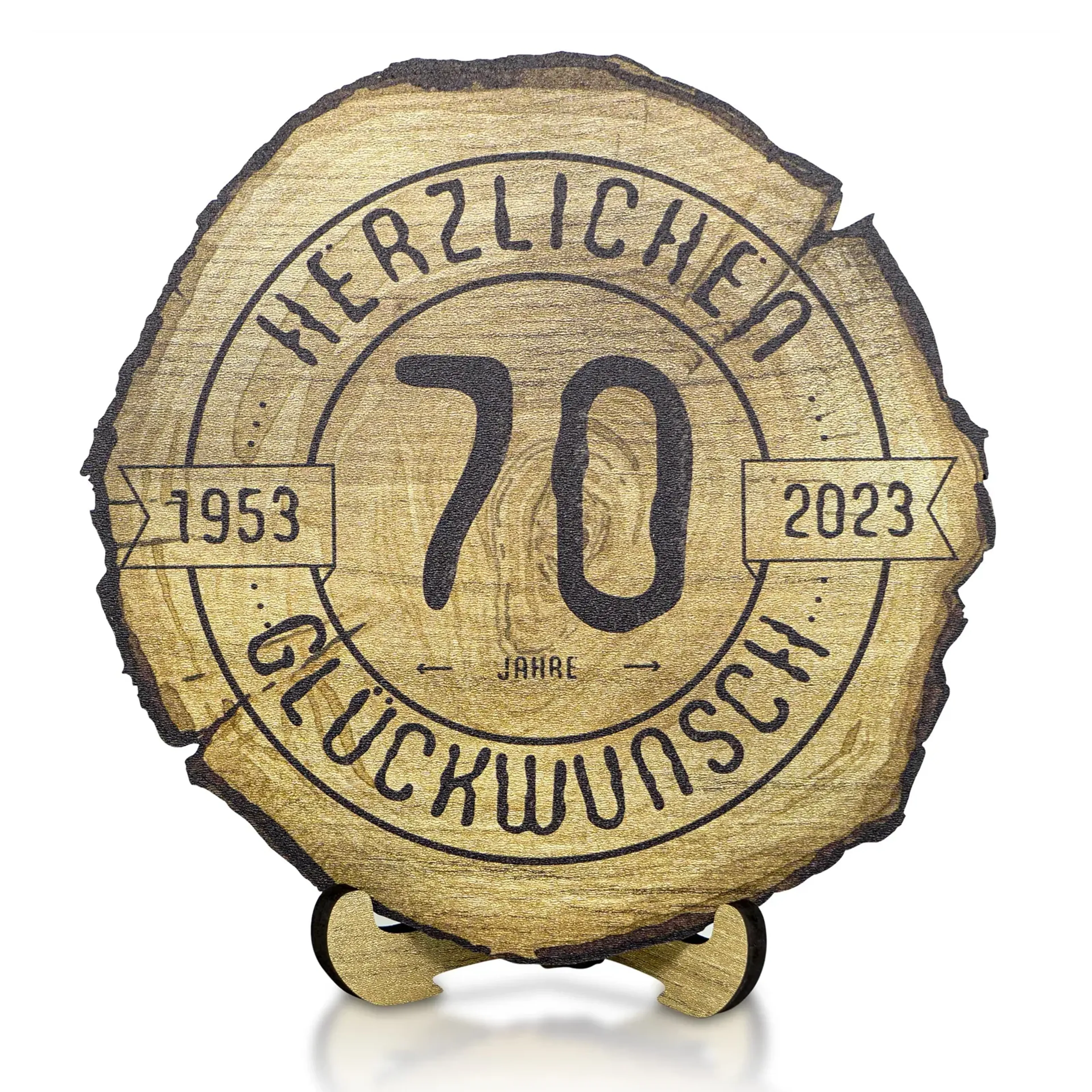 Helle Baumscheibe mit dunklem Rindenrand und Ständer, im Beispiel mit Glückwunschgravur zum siebzigsten Geburtstag.