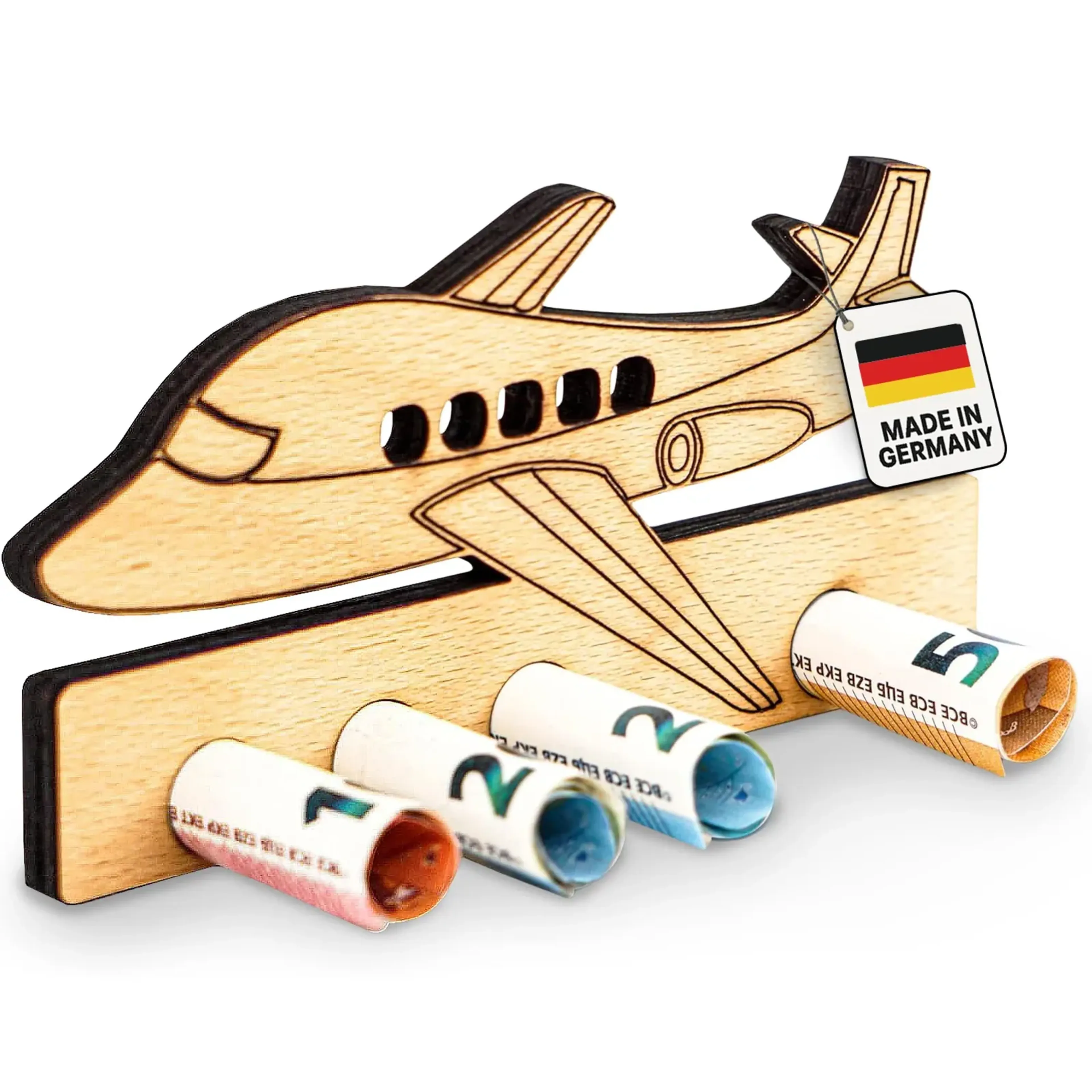 Flugzeug aus hellem Holz mit ausgesparten Fenstern und gerollten Geldscheinen in der Leiste darunter.