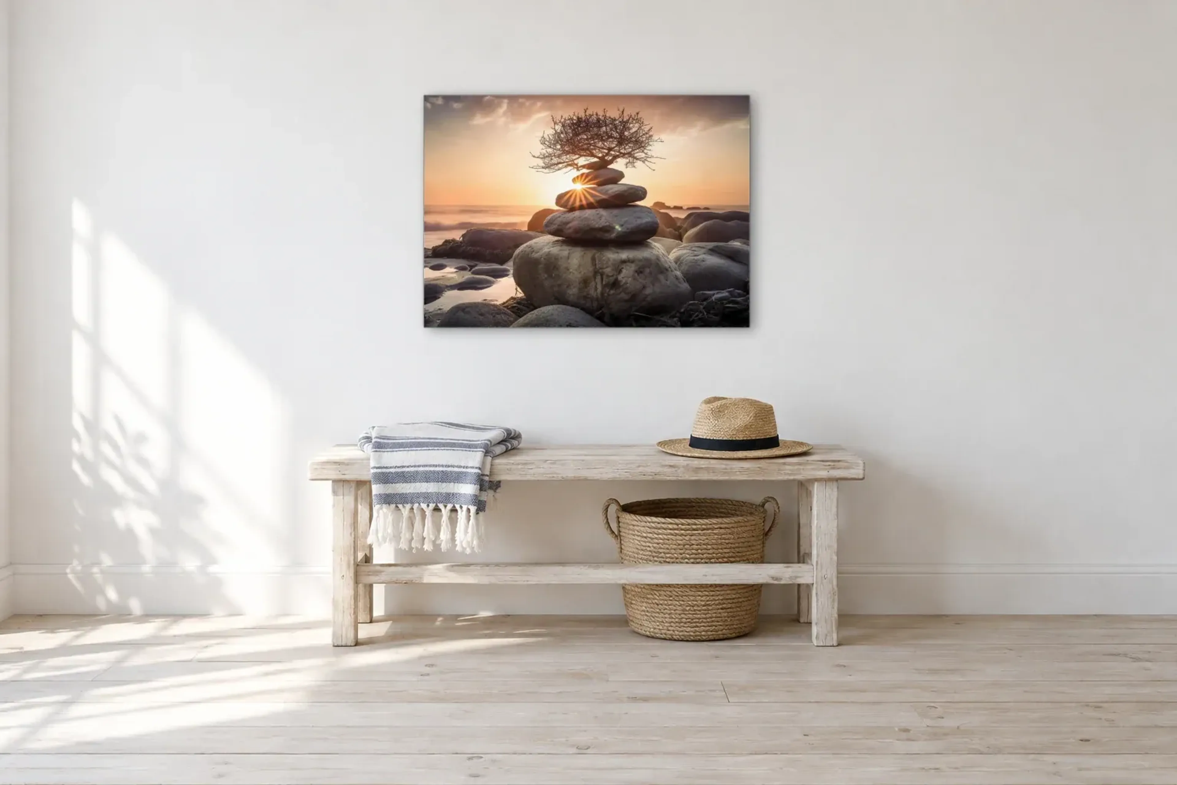 Steinturm im Abendlicht als Wandbild über einer 100-cm-Bank