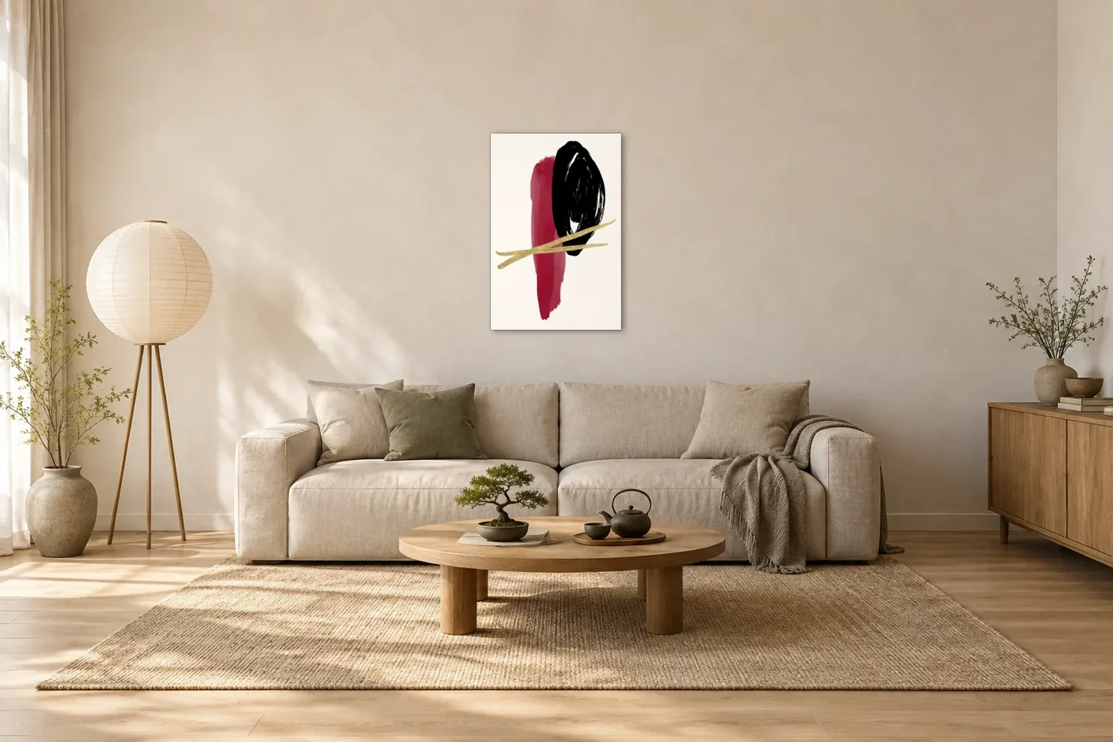 Schwarzer Kreis mit Goldlinien als Wandbild über einem 220-cm-Sofa
