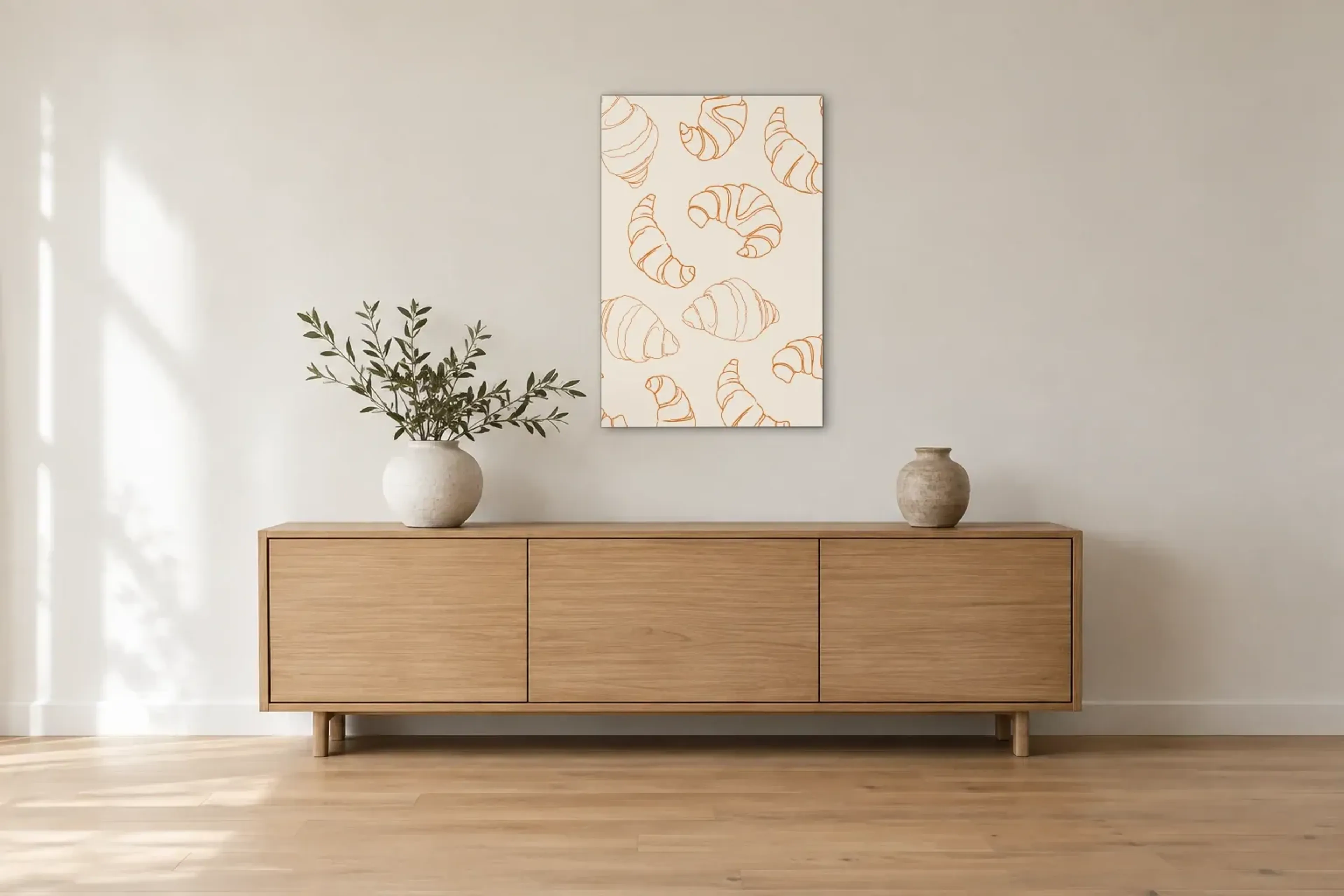 Croissants in Orange als Wandbild über einem 180-cm-Sideboard