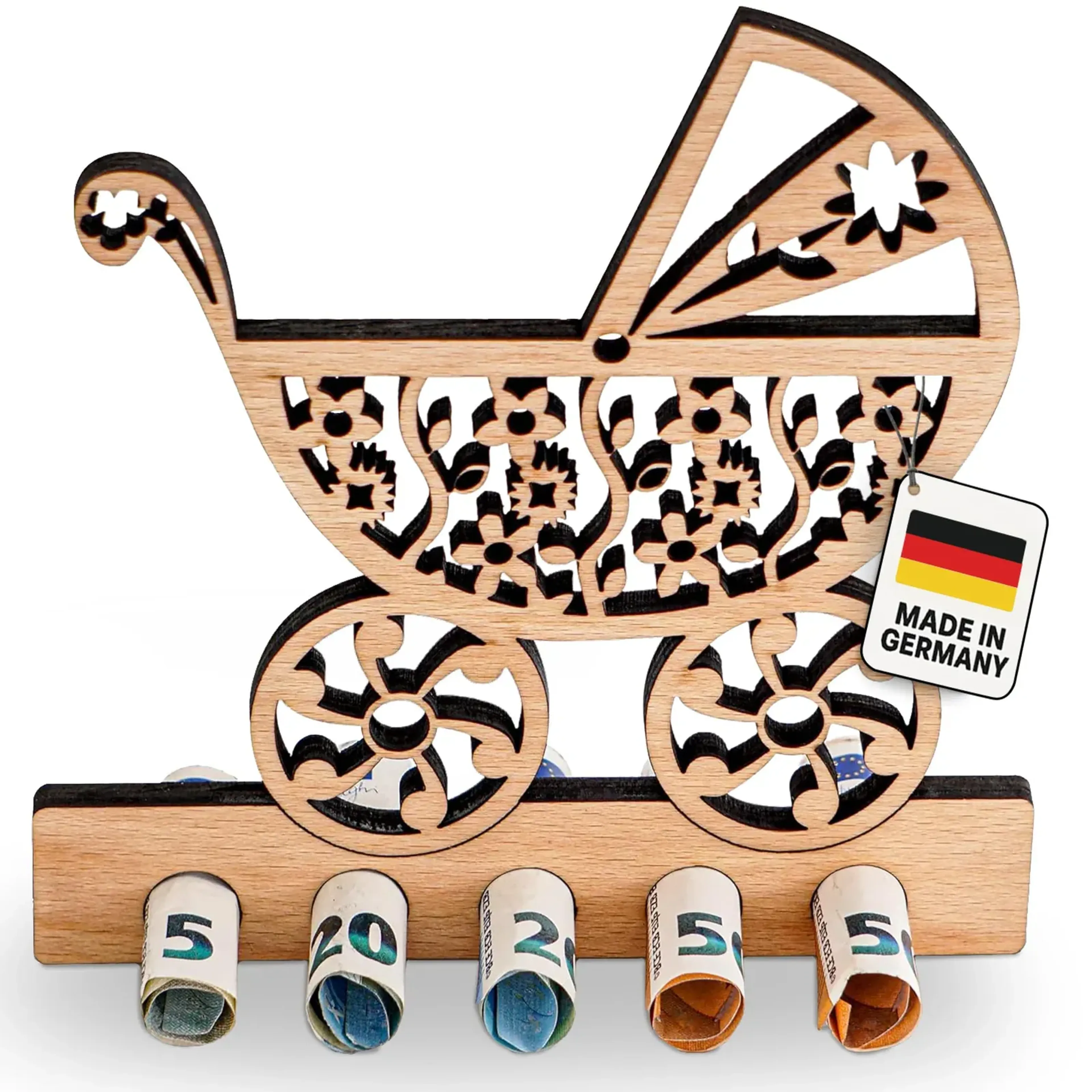 Kinderwagen aus Holz mit ausgesparten Blumenmustern, zwei großen Rädern und gerollten Geldscheinen.